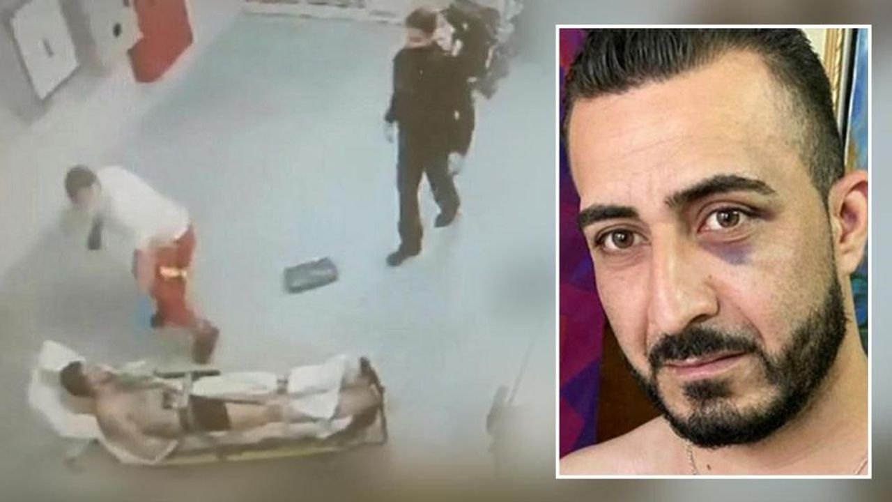 Sağlıkçı sedyedeki mülteciye polisin yanında yumruk attı