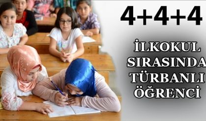 İlkokul sırasında türbanlı öğrenci